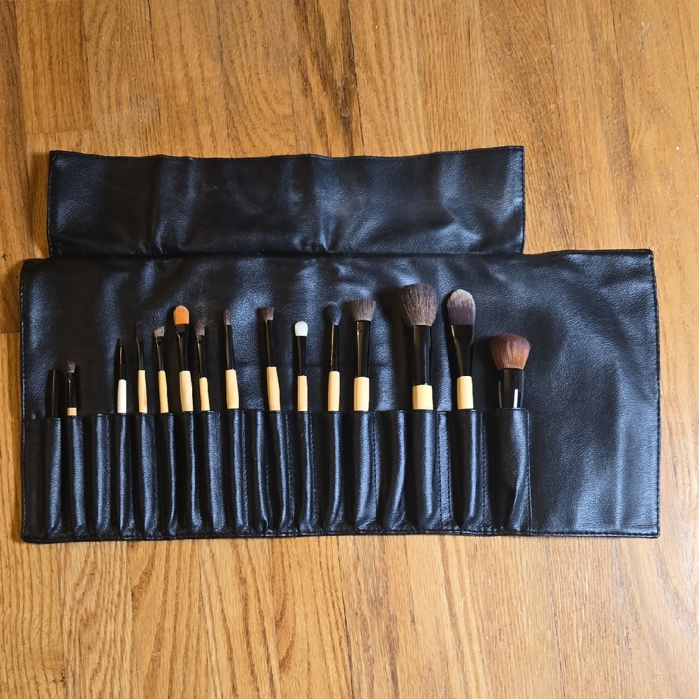 Bobbi Brown black brush roll with 15 brushes